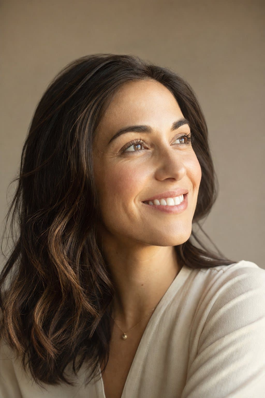 Warm portrait, calm joy toward the light. Illustrative image — not a patient.